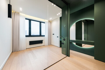 Modern minimalist interior design of a stylish room featuring large windows and elegant lighting