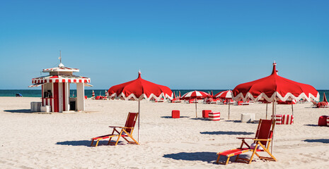 Sand exotic beach with umbrella. Sunny weather at beach sun. Summer vacation. Beach vacation at sea...
