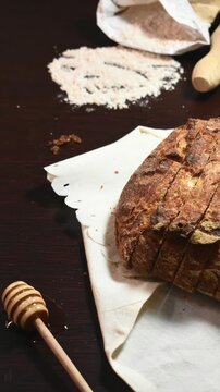 Bread stop motion video
Artisan bread on a wooden table with traditional white tablecloth, Artisan bread on a wooden table with traditional white tablecloth