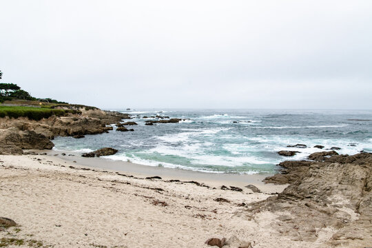 Pebble Beach, CA Sandy Beach and Coastline on Foggy Day