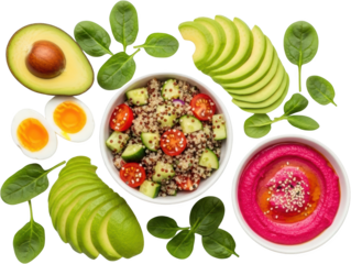 Vibrant quinoa salad sliced avocado boiled eggs and beet hummus with spinach leaves transparent background