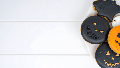 Halloween-Themed Cookies With Festive Designs on a White Background