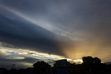 Cloudscape, Colored Clouds at Sunset near the city 