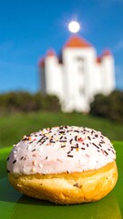 Donut with sprinkles, castle backdrop