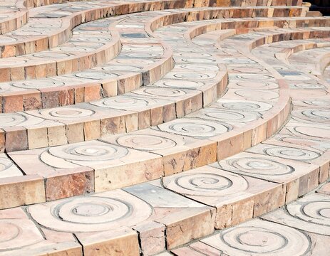 Circular patterned outdoor steps - Powered by Adobe