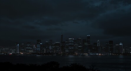 Fototapeta premium Chicago Skyline at Night: Illuminated Skyscrapers Reflecting on Lake Michigan
