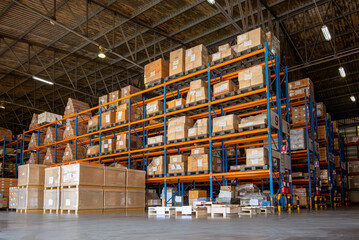 Shelf rack full of cartons at logistics warehouse