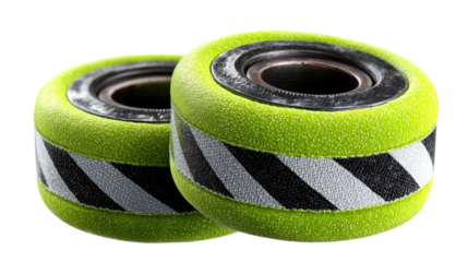 Colorful Wheel Focus: Two vibrant green wheels, with striking black and white stripes, are isolated against a subtle backdrop, offering a dynamic perspective. 