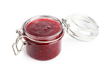 Sweet raspberry jam in glass jar isolated on white