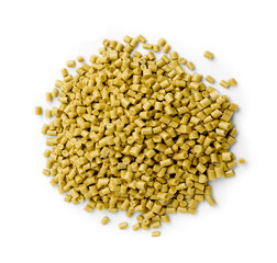 Pile of yellow plastic granules isolated on white, top view
