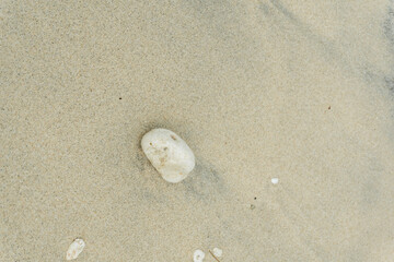 Close-up of beautiful white sand and smooth pebbles on Pandawa Beach, Nusa Dua, Bali