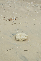 Close-up of beautiful white sand and smooth pebbles on Pandawa Beach, Nusa Dua, Bali