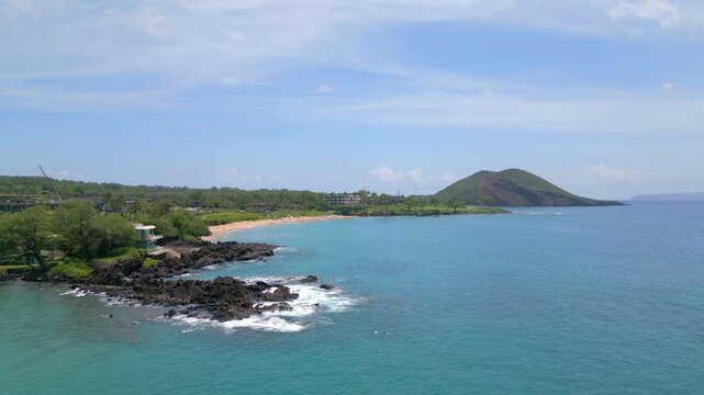 Aerial Drone View of the South Maui Coastline with the Iconic Puʻu ʻŌlaʻi Cinder Cone in the Background, Makena, Hawaii