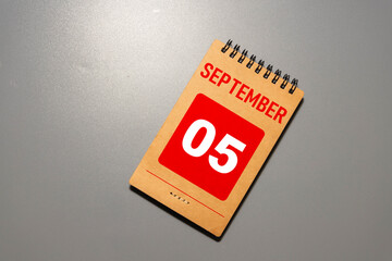 Wooden calendar with the date September 05