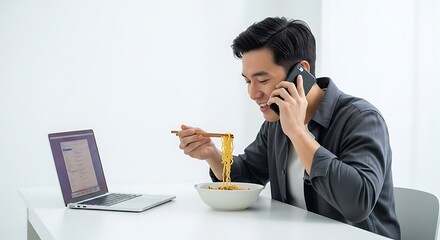 A man multitasking: Eating Noodles While on a Phone Call.