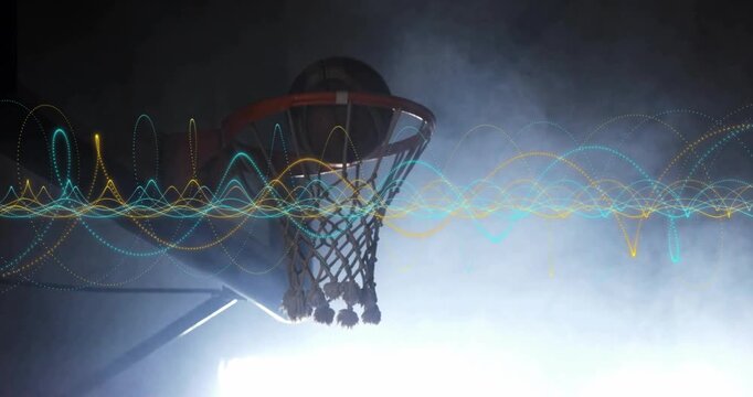 Athlete gripping basketball at rim powering dunking through net in sports while waveform pulsing