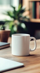 Fototapeta premium White Coffee Mug on Wooden Desk with Green Plant in Background