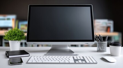 Fototapeta premium Modern workspace with desktop computer, keyboard, mouse, smartphone, and plant on a white desk. Clean and minimalist design.