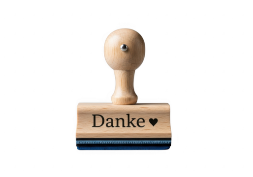 Wooden stamp with the word danke and a heart isolated on transparent background