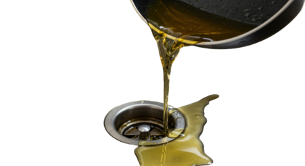 Yellow Oil Pours From Frying Pan Into Sink Drain with Transparent Background