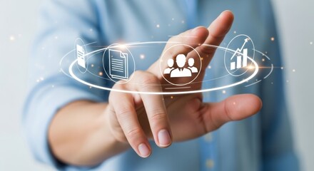 Human Hand Interacting with Futuristic Digital Interface of Business Icons and Data Visualization