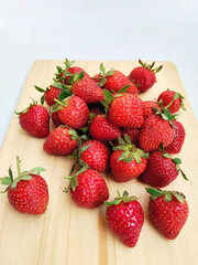 Fresh Organic Strawberries on Rustic Wooden Cutting Board