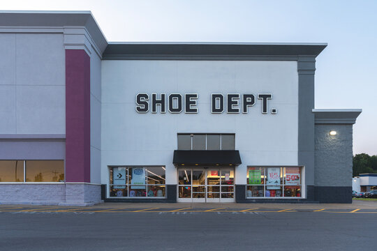 New Hartford, NY - Aug 1, 2025: Close-up view Shoe Dept. storefront, is an American footwear retailer based in Concord, North Carolina and has 63 years of experience owned by Shoe Show, Inc.