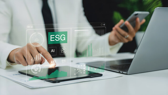 ESG and AI data analysis on interactive screen at modern office desk setting