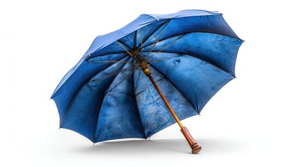 A used blue umbrella, slightly rain-stained,  open and angled,  against a white background
