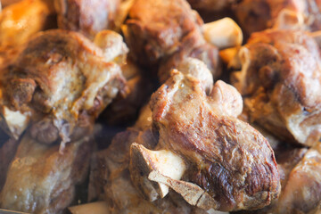 Tasty slow-cooked meat dish on display at food market