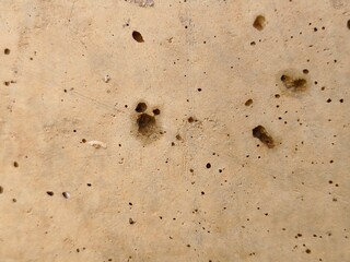 Brown background with small holes
