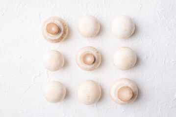 Top view of fresh white Champignon mushroom (botton mushroom) on white background, Edible mushroom, Food ingredients