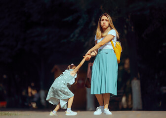 Child Misbehaving in Public Being a Troublemaker Exasperating Mom. Mother exasperated by a tantrum crisis in the middle of the street 
