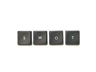 SWOT letter from keyboard key on white background. Business strategy and planning concept