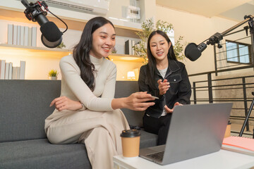 LGBTQ podcast hosts discussing topics with joy and enthusiasm
