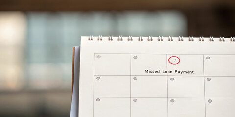 Missed loan payment torn calendar page financial deadline overdue stress reminder monthly bill late fee personal finance planning