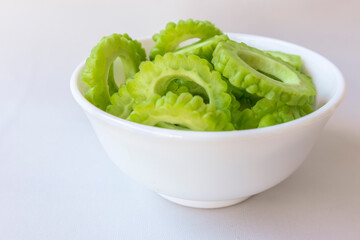 Bitter melon or bitter gourd on white background.