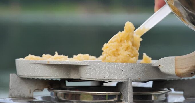 Camping concept, sticky rice in a pan and stove
