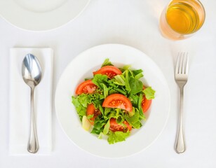 Vegetable salad served on a white plate