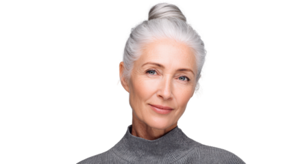 Portrait of an elderly woman with gray hair, smiling softly against a white background.