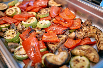 A Colorful Medley of Grilled Vegetables Including Zucchini, Eggplant, Bell Peppers, and Mushrooms Prepared for a Delicious and Healthy Meal Option