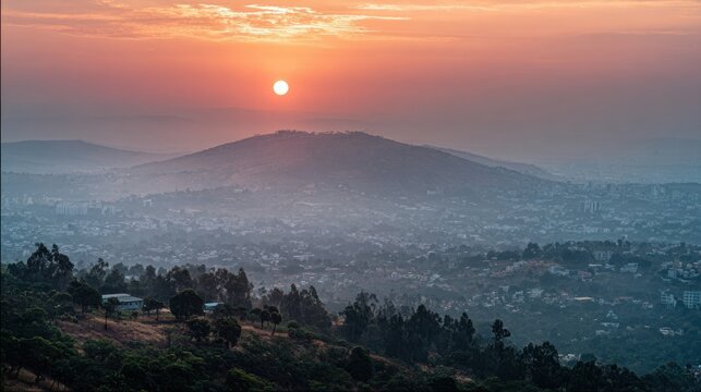 Sunrise over Addis Ababa, Ethiopia: A breathtaking panorama of the city nestled in the mountains at dawn.