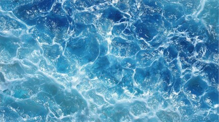 Obraz premium Bright blue waves crash and flow rhythmically, reflecting sunlight and creating a lively texture on the surface. The ocean appears expansive and full of energy at midday.