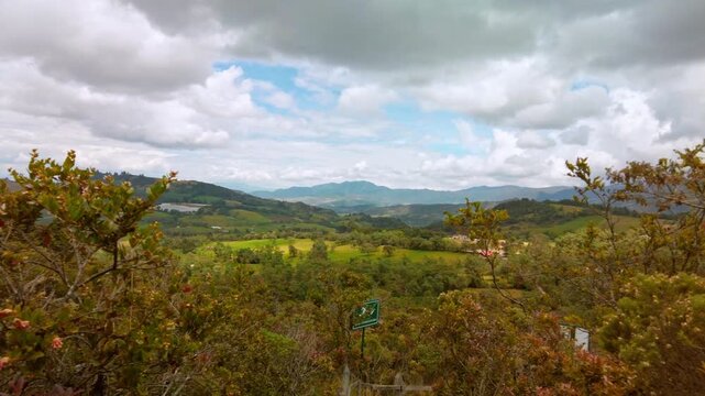 Panoramic view of the mountains of the Colombian altiplano at the Guatavita lagoon on a cloudy day with