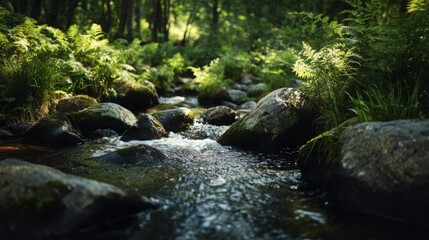 Fresh mountain stream running over smooth stones in a forest, framed by soft light and vivid greenery 