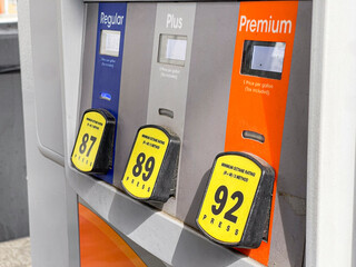 Three Grades of Fuel on a Gas Pump