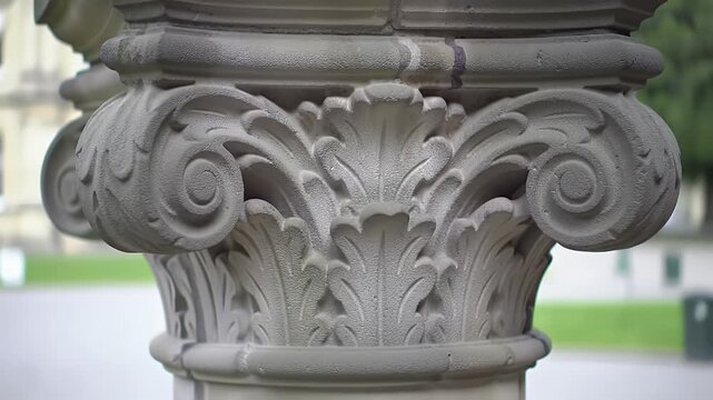 Weathered Gray Stone Column Capital with Acanthus Leaf Carvings Architectural Detail