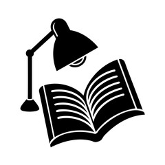 Illuminated Open Book Under Desk Lamp for Learning and Study