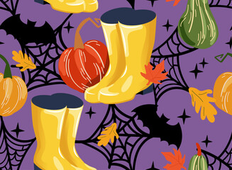 Obraz premium Halloween seamless pattern with pumpkins, yellow rain boots, black bats and spider webs against a deep purple background. perfect for holiday textiles, party decor or digital projects