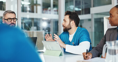 Fototapeta premium Nurse, man and talking with team in office for planning, medical report and feedback on operation. People, tablet and meeting for healthcare, surgery schedule and brainstorming for hospital funding